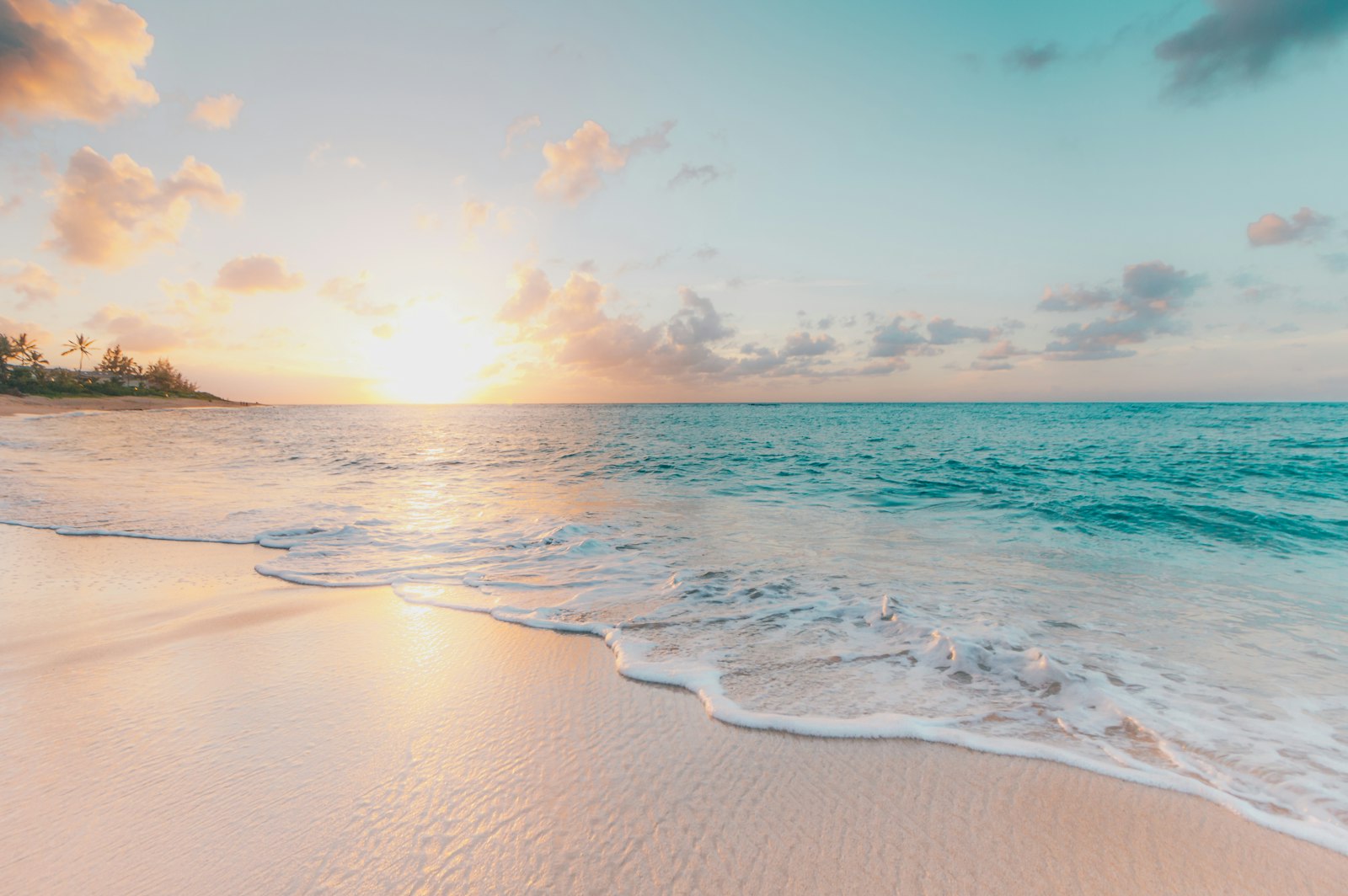 Sunrise over a quiet sandy beach